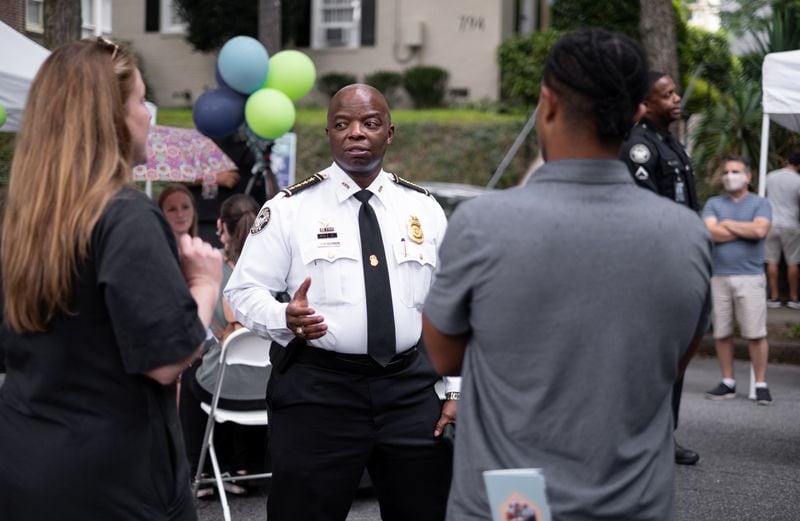Atlanta Police Chief Rodney Bryant talks with residents in Midtown Atlanta on Tuesday evening August 3, 2021 during a National Night Out event hosted by the Midtown Neighbors’ Association. Ben Gray for the Atlanta Journal-Constitution