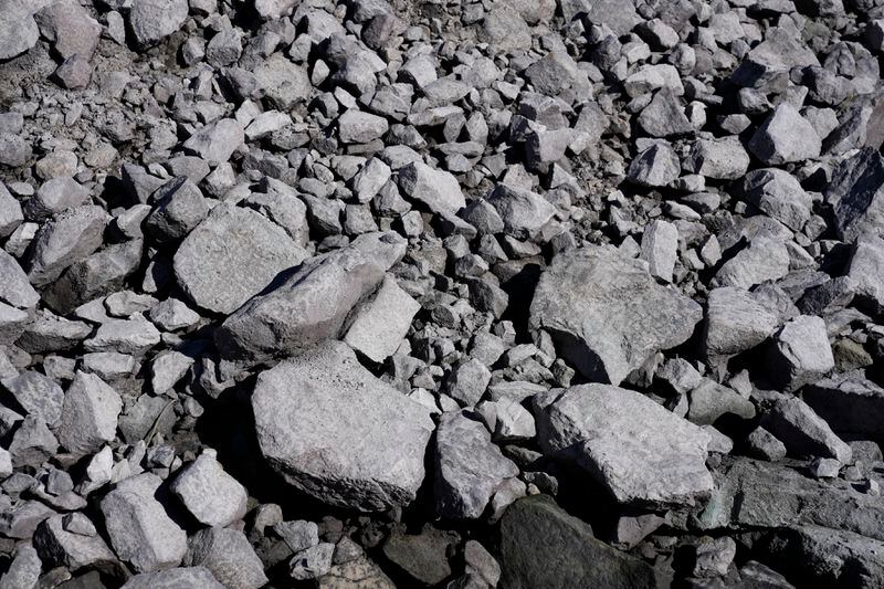 A uranium ore rock pile is the first to be mined at the Energy Fuels Inc. uranium Pinyon Plain Mine Wednesday, Jan. 31, 2024, near Tusayan, Ariz. The largest uranium producer in the United States is ramping up work just south of Grand Canyon National Park on a long-contested project that largely has sat dormant since the 1980s. (AP Photo/Ross D. Franklin)