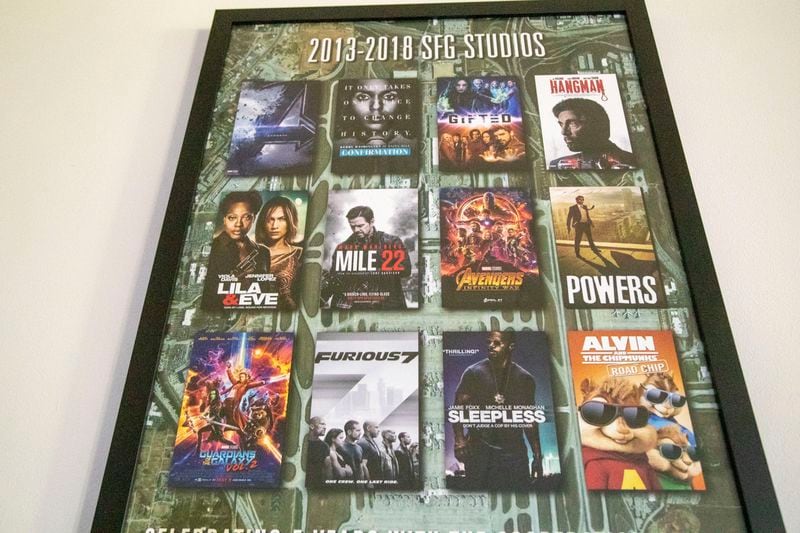 A poster featuring movies created by SFG studios using the former Sheraton Atlanta Airport Hotel is displayed in the hotel in College Park, Friday, September 4, 2020. The hotel was acquired by the City of Atlanta for $16.8 million in 2017. Since the purchase, the hotel, which had a convention center attached, has been used for movie production. The city plans to demolish the hotel to make way for a runway expansion project. (Alyssa Pointer / Alyssa.Pointer@ajc.com)