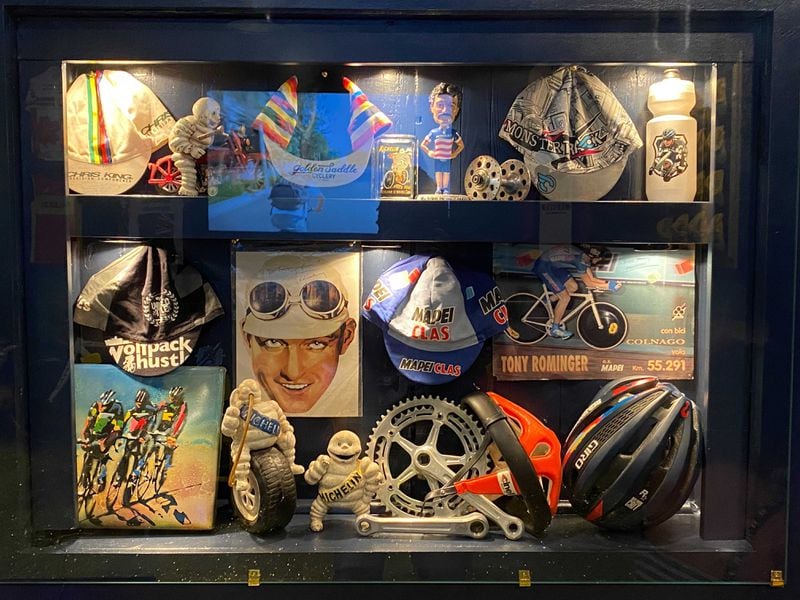 A case with cycling memorabilia at the Handlebar. / Courtesy of the Handlebar