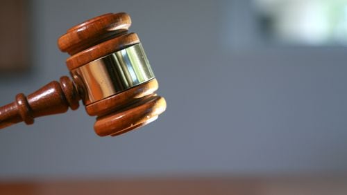 A Marietta man was sentenced to a decade in prison for bringing child pornography into America.