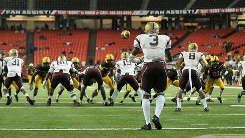 Atlanta, Ga. -- Tucker junior CB Joshua Vann (3) takes the snap and kicks in the first half of the Class AAAAAA state title game at the Georgia Dome Friday, December 9, 2016. SPECIAL/Daniel Varnado