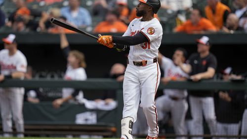 Baltimore Orioles' Cedric Mullins watches the ball after hitting a walk-off home run in the ninth inning of a baseball game against the Minnesota Twins, Wednesday, April 17, 2024, in Baltimore. The Orioles won 4-2. (AP Photo/Jess Rapfogel)