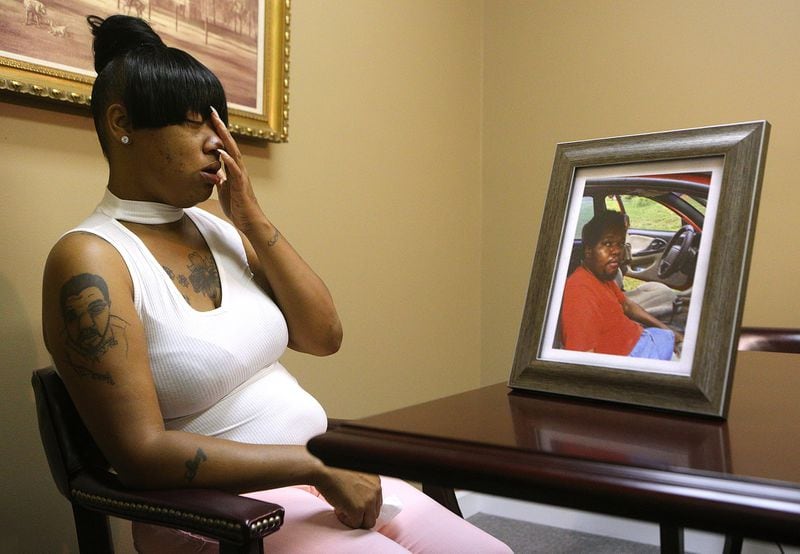 Belinda Taylor, 33, lost her brother, Jessie Taylor III, in 2015 after his wheelchair topped over during a medical transport ride. She last spoke to him the night before his Christmas Eve death. CURTIS COMPTON / CCOMPTON@AJC.COM