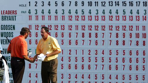 Retief Goosen, of South Africa, left, shakes hands with leader Bart Bryant after they finished the third round of the Tour Championship at East Lake Golf Club in Atlanta Saturday, Nov. 5, 2005.    (AP Photo/John Bazemore)