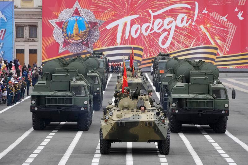 Russian S-400 anti-aircraft missile system launchers and APCs roll during a rehearsal for the Victory Day military parade at Dvortsovaya (Palace) Square in St. Petersburg, Russia, Sunday, May 5, 2024. The parade will take place at St. Petersburg's Palace Square on May 9 to celebrate 79 years since the victory in WWII. (AP Photo/Dmitri Lovetsky)