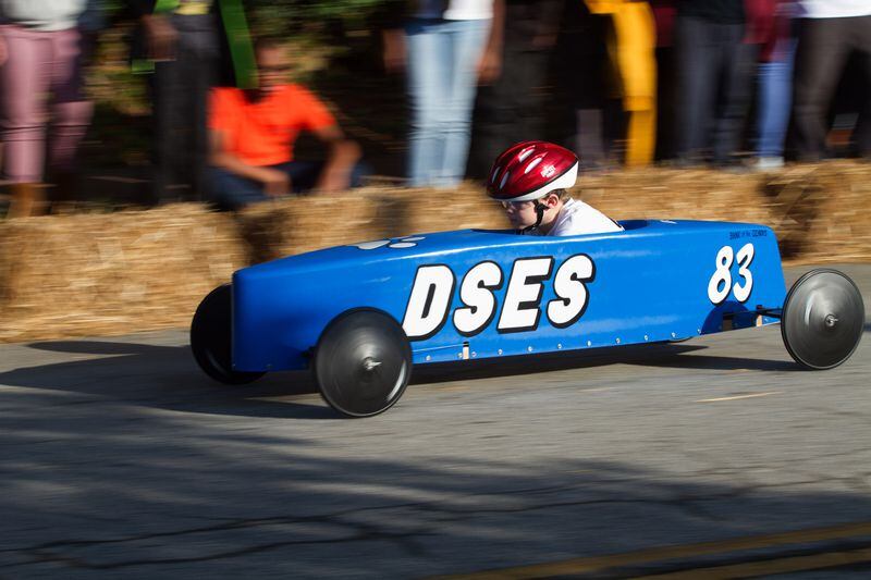 A car heads for the finish line during the Gravity Games on Saturday, Nov. 4, 2017, in downtown Douglasville. 