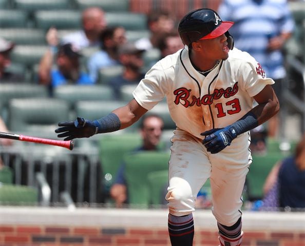 Photos: Braves try to outscore Brewers
