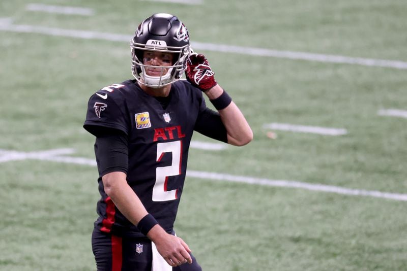 Falcons quarterback Matt Ryan (2) reacts after throwing an interception in the fourth quarter against the Carolina Panthers Sunday, Oct. 11, 2020, at Mercedes-Benz Stadium in Atlanta. The Falcons lost 23-16 to start the season 0-5. (Jason Getz/For the AJC)