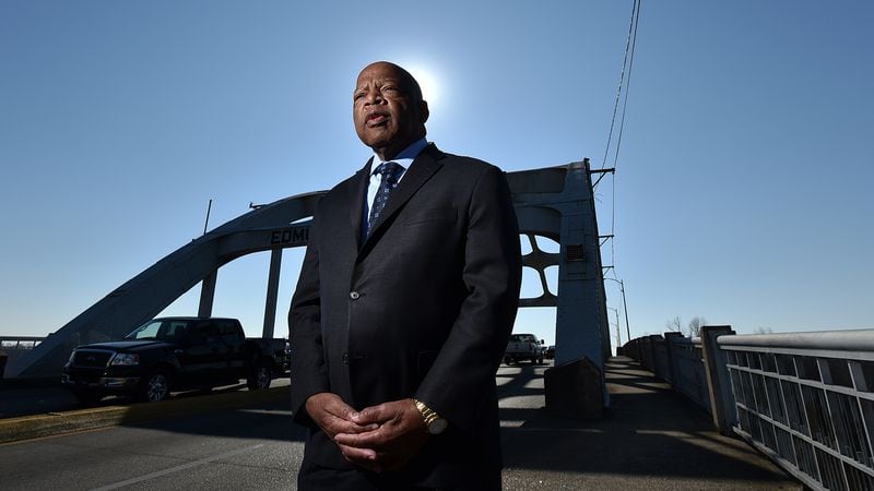 February 14, 2015 Selma, AL: Congressman John Lewis on the Edward Pettus Bridge February 14, 2015.  On March 7, 1965  Hosea Williams and John Lewis  led 600 civil rights activists across the Edward Pettus Bridge in a march for voting rights.  Lewis had no idea  the level of violence that awaited the group on the other side of the bridge. In what would become known around the country as as Bloody Sunday, state troopers and sheriff deputies used tear gas and clubs to break up the march.  Leaving Lewis with a skull fracture and sending more than 50 others to the local hospital for treatment.   BRANT SANDERLIN / BSANDERLIN@AJC.COM
