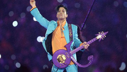 In this Feb. 4, 2007 file photo, Prince performs during the halftime show at the Super Bowl XLI football game at Dolphin Stadium in Miami. The singer will have his own SiriusXM channel for the month of May 2020. (AP Photo/Chris O'Meara, File)