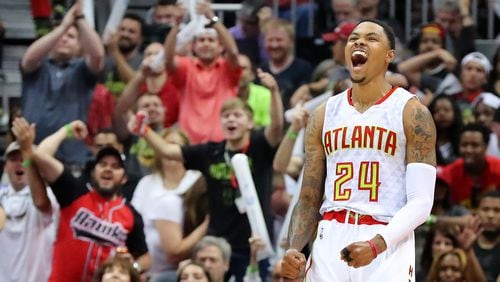 Atlanta Hawks’ Kent Bazemore and fans celebrate as he hits a 3-pointer against the Wizards during a 116-98 victory in Game 3 of a first-round NBA basketball playoff series on Saturday, April 22, 2017, in Atlanta. Curtis Compton/ccompton@ajc.com