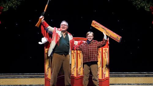 Chris Carsten as the older Ralphie and Myles Moore as the younger Ralphie in “A Christmas Story: The Musical” at the Fox Theatre through Sunday. (On opening night, the younger Ralphie was played by Austin Molinaro.) CONTRIBUTED BY JESSE SCHEVE
