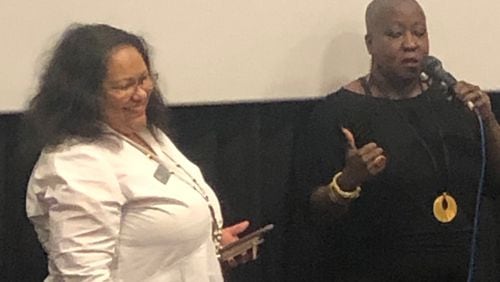 Iyabo Onipede, co-director of Compassionate Atlanta and Denitra Isler, a member of the cast of "Just Mercy," lead a discussion about the film following the fundraiser screening at AMC North DeKalb 16 Friday, Jan. 10. ARLINDA SMITH BROADY/AJC