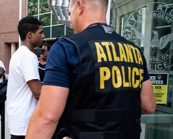 200715-Atlanta-Julian Conley, who is accused of felony murder in the shooting death of 8-year-old Secoriea Turner, turns himself in to the Atlanta Police Department with his attorney Jackie Patterson on Wednesday afternoon July 15, 2020. Ben Gray for the Atlanta Journal-Constitution