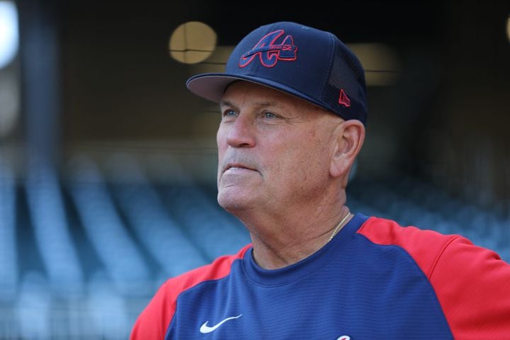 Atlanta Braves manager Brian Snitker watches his team during warm-ups at Truist Park before a game against Chicago Cubs on Wednesday April 27, 2022. Miguel Martinez/miguel.martinezjimenez@ajc.com