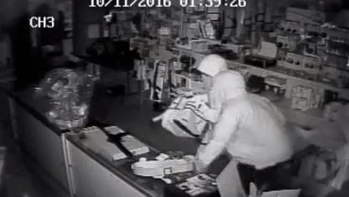 Photo from surveillance video of a gun-store theft in Monroe County. (Credit: The Telegraph)