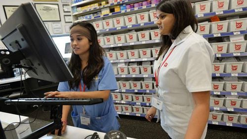 Among the 14 free programs are 14 weeks of training as a pharmacy technician. AJC file photo