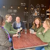 Members of the Just One More Page Book Club discuss good books they've read lately. The club meets at the Marietta Coffee Shop and is for readers who aren’t looking for any personal connections outside of the club. Courtesy of Dana DiLorenzo