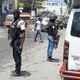 National Police patrol an intersection amid gang violence in Port-au-Prince, Haiti, Monday, April 8, 2024. (AP Photo/Odelyn Joseph)
