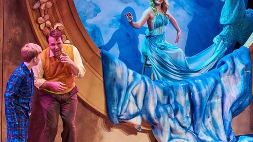 Gabriel Bowles (from left), Travis Smith and Caroline Arapoglou appear in Theatrical Outfit’s musical “Big Fish.” CONTRIBUTED BY CHRISTOPHER BARTELSKI