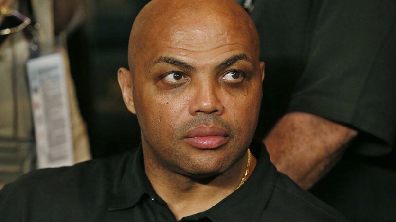 FILE - In this May 2, 2015, file photo, Charles Barkley joins the crowd before the start of the world welterweight championship bout between Floyd Mayweather Jr., and Manny Pacquiao in Las Vegas. Barkley calls it friendly fire, the criticism a rich black gets for talking about race from fellow blacks who believe he can't understand their struggles. But the basketball Hall of Famer and TNT analyst says he can handle it, and hopes he can create conversation that makes a difference beyond the things he's already doing when his show "The Race Card" debuts in 2017. (AP Photo/John Locher, File)