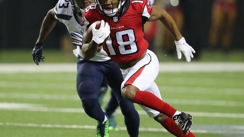 January 14, 2017, Atlanta: Falcons wide receiver Taylor Gabriel makes a 36 yard gain against the Seahawks during the second quarter in a NFL football NFC divisional playoff game on Saturday, Jan. 14, 2017, in Atlanta. Curtis Compton/ccompton@ajc.com