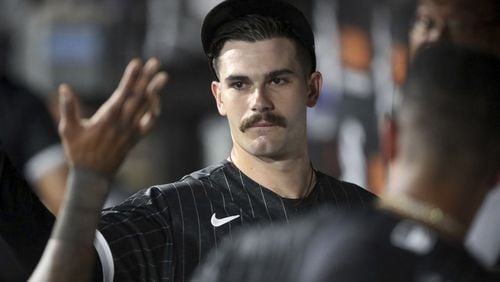 White Sox starting pitcher Dylan Cease receives a high-five in the dugout after finishing off the Toronto Blue Jays in the sixth inning on June 21, 2022, at Guaranteed Rate Field. (Chris Sweda/Chicago Tribune/TNS)