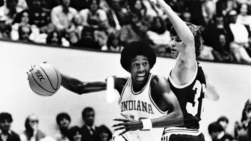 Indiana University's Mike Woodson drives around Washington's Stan Walker during the championship game of the Indiana Classic Dec. 19, 1978, in Bloomington, Ind. (AP)