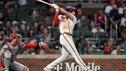 Atlanta Braves' first baseman Matt Olson (28) hits a solo home run during the fifth inning at Truist Park, Thursday, September 7, 2023, in Atlanta. (Hyosub Shin / Hyosub.Shin@ajc.com)