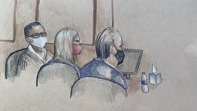 Mitzi Bickers (L) listens in U.S. District Court in Atlanta on the Wednesday, March 9, 2022, during the first day of jury selection in her public corruption trial. Seated beside her are defense attorneys Marissa Goldberg and Drew Findling. Credit: Artist Lucy Luckovich.