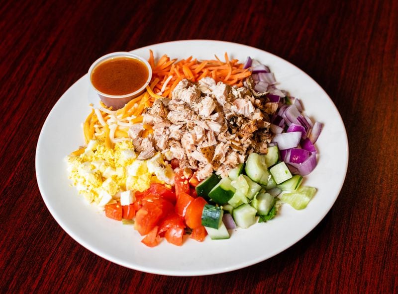 A somewhat lighter option at Dreamland is the Smokehouse Cobb Salad (shown here with barbecued pork, but also available with chicken). CONTRIBUTED BY HENRI HOLLIS