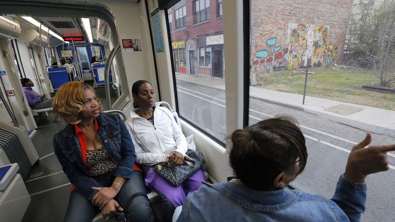 Mar. 7 2017 - Atlanta - Angela Gilliard (from left), Janet Darthard, and Janice Gregory, visiting from Oklahoma City, were excited to ride the streetcar and get an overview of the historic sites along the route.  BOB ANDRES /BANDRES@AJC.COM