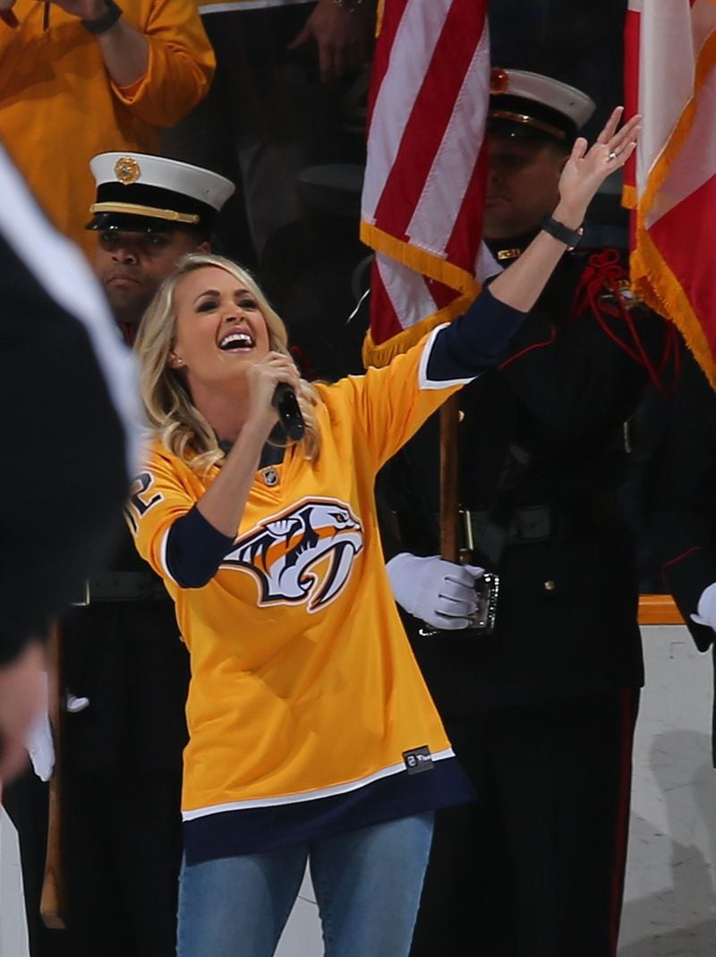  NASHVILLE, TN - APRIL 29: Singer Carrie Underwood sings the national anthem prior to Game Two of the Western Conference Second Round between the Nashville Predators and the Winnipeg Jets during the 2018 NHL Stanley Cup Playoffs at Bridgestone Arena on April 29, 2018 in Nashville, Tennessee. (Photo by Frederick Breedon/Getty Images)