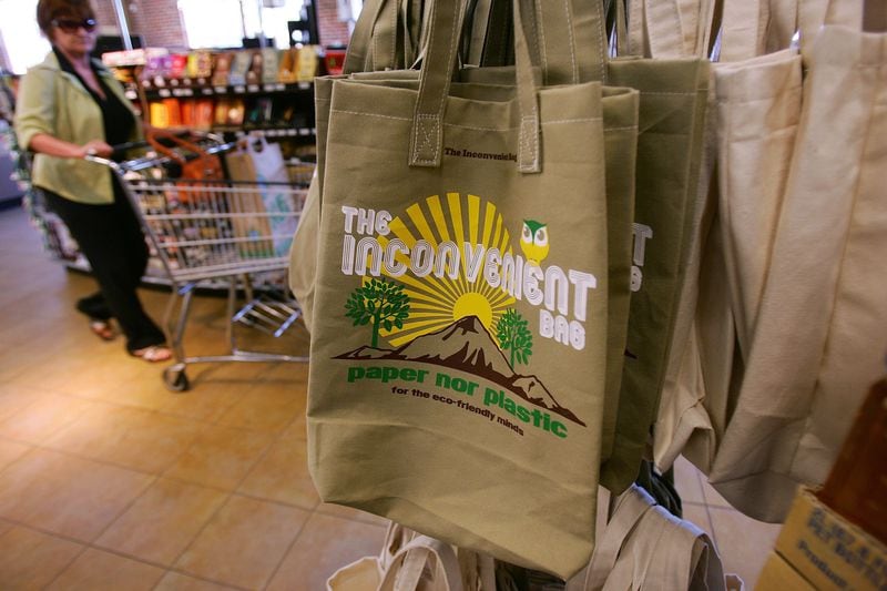 Reusable grocery bags are shown at a Whole Foods Market, which banned the use of disposable plastic grocery bags in its 270 stores in the U.S., Canada and UK in 2008.