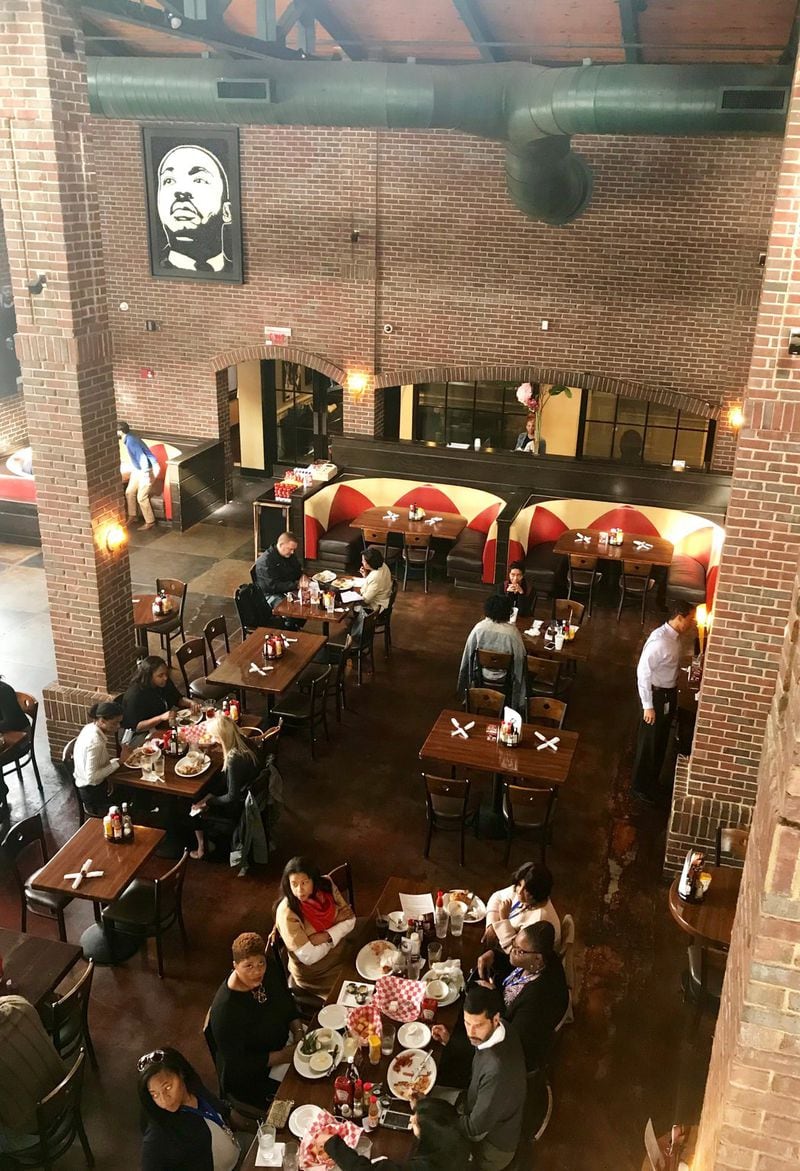 The interior of Paschal’s gives a nod to the restaurant’s place in the civil rights movement. LIGAYA FIGUERAS / LFIGUERAS@AJC.COM