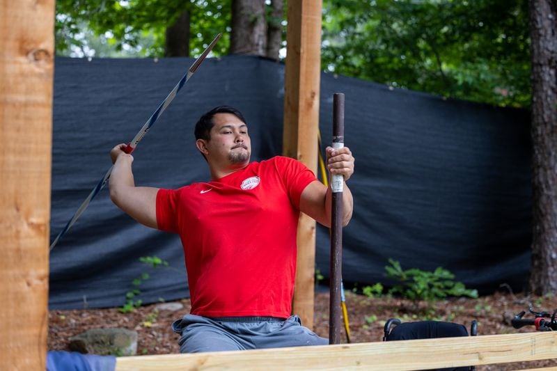 American Paralympic Medalist Justin Phongsavanh practices throwing javelins at his McDonough home. He was paralyzed from the chest down after being shot in a parking lot in 2015. He competed for Team USA at the 2020 Tokyo Paralympics and earned the bronze in javelin & continues to train for future Paralympics. PHIL SKINNER FOR THE ATLANTA JOURNAL-CONSTITUTION