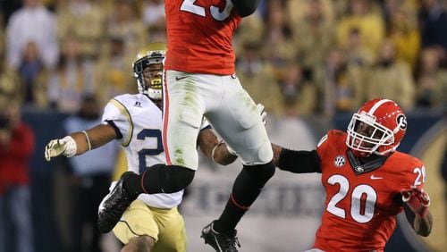 Georgia safety Josh Harvey-Clemons, seen here returning an interception in a Nov. 30, 2013, game against Georgia Tech, won't be playing in the Jan. 1, 2014, Gator Bowl.