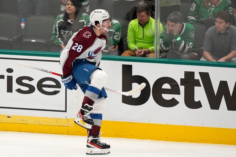 Colorado Avalanche left wing Miles Wood (28) celebrates after scoring in overtime in Game 2 of an NHL hockey Stanley Cup second-round playoff series against the Dallas Stars in Dallas, Tuesday, May 7, 2024. (AP Photo/LM Otero)