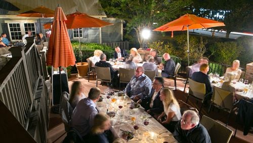 October 27, 2016 - Milton, Ga: Patrons dine on the outdoor patio during the Harvest Dinner at Milton's Cuisine and Cocktails Thursday October 27, 2016, in Milton, Ga. The History of Milton as told though some food destinations such as Milton's Cuisine and Cocktails. Milton's has been many restaurants over the years, but the historic property is intact. This is for the February 2017 issue of Living Northside. PHOTO / JASON GETZ