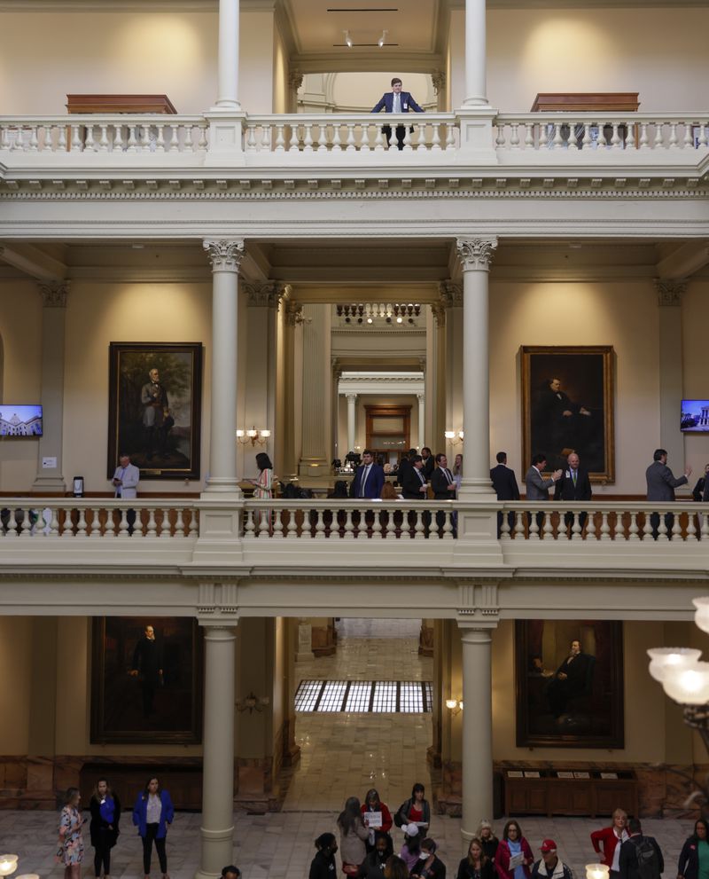 Lobbyists gather Monday in the Capitol as they wait for the session to start on Sine Die, the last day of the General Assembly for 2022. (Bob Andres / robert.andres@ajc.com)