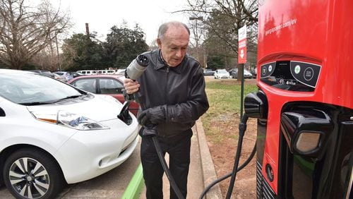 Don Francis, executive director of Clean Cities Georgia, charges his electric vehicle using DC Fast Charging station at Agnes Scott College, in this file photo from January 2016. Francis is hoping lawmakers will take another look at incentives for electric cars, perhaps with a break on sales tax. HYOSUB SHIN / HSHIN@AJC.COM
