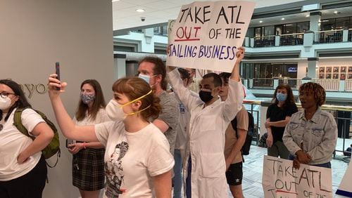 A group of protestors gathers outside the Atlanta mayor's office pushing for the closure of the Atlanta city jail on Monday, Aug. 1, 2022. (Photo by J.D. Capelouto)