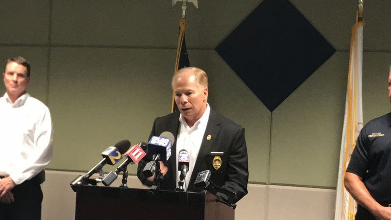 During a news conference Tuesday, Cobb County police Chief Mike Register confirmed the department was investigating Officer Robert Lanier New regarding an administrative complaint filed against him. New was arrested Monday on allegations he abused a mentally disabled woman. RAISA HABERSHAM / RAISA.HABERSHAM@AJC.COM