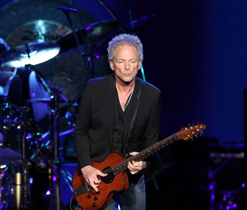 #2 of #22. PLEASE KEEP IN SEQUENTIAL ORDER FOR THE CONTINUITY OF THE GALLERY. -- Lindsey Buckingham plays on "The Chain." Iconic rockers Fleetwood Mac brought their On With the Show tour to an energized and sold out Philips Arena Wednesday night, December 17, 2014. Touring with Christine McVie for the first time in 16 years, Stevie Nicks, Mick Fleetwood, Lindsey Buckingham and John McVie looked and sounded in exceptional form. Robb D. Cohen/RobbsPhotos.com Lindsey Buckingham, performing at Philips Arena in 2014. Photo: Robb D. Cohen/www.RobbsPhotos.com.
