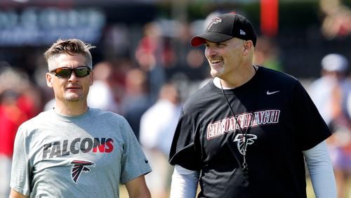 Falcons hired Thomas Dimitroff (left) as head of his franchise’s football operations in January 2008. Coach Dan Quinn (right) has final say over the 53-man roster.
