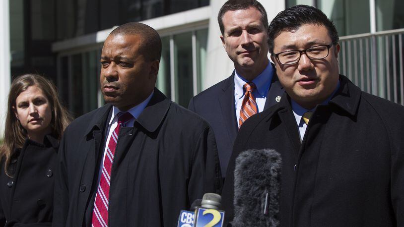 U.S. Attorney, Byung “BJay” Pak, right, and Director of the SEC’s Atlanta Regional Office, Richard R. Best, left, speak at a press conference outside the Richard B. Russell Courthouse in Atlanta. Pak and Best addressed the federal indictment of former Equifax executive Jun Ying for insider trading related to alleged sales of the company’s stock before Equinox announced a massive data breach. (REANN HUBER/REANN.HUBER@AJC.COM)