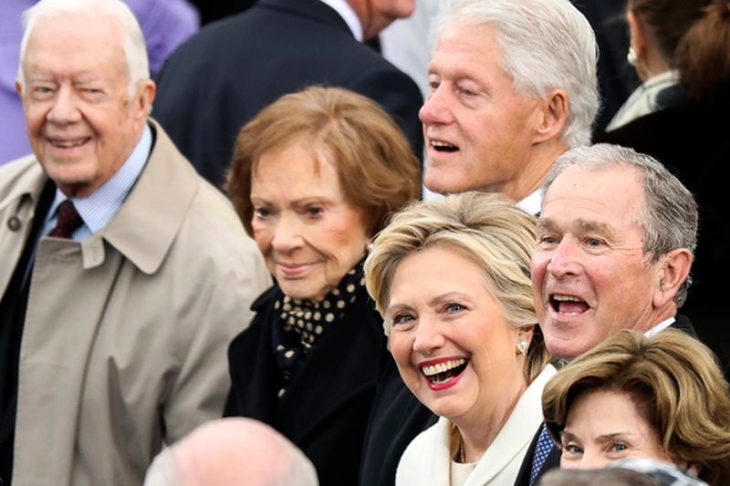 In this Jan. 20, 2017 file photo, from left, former President Jimmy Carter, Rosalynn Carter, former President Bill Clinton, Hillary Clinton and former President George W. Bush wait for the 58th Presidential Inauguration to begin at the U.S. Capitol in Washington. "