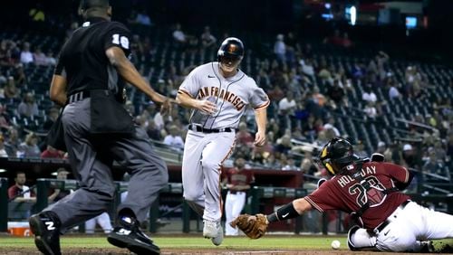 Outfielder Alex Dickerson, who played for the Giants last season, signed a non-guaranteed, major-league contract worth $1 million. (AP Photo/Rick Scuteri)