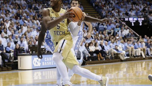 Georgia Tech's Josh Okogie drives to the basket against North Carolina during the second half of an NCAA college basketball game in Chapel Hill, N.C., Saturday, Jan. 20, 2018. North Carolina won 80-66. (AP Photo/Gerry Broome)